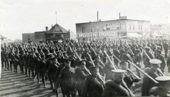 Red Deer Archives, P147; 12th Canadian Mounted Rifles marching to CPR Station, 1915