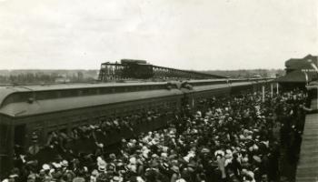 Red Deer Archives, P211; Passenger train filled with military men in Red Deer, 1915