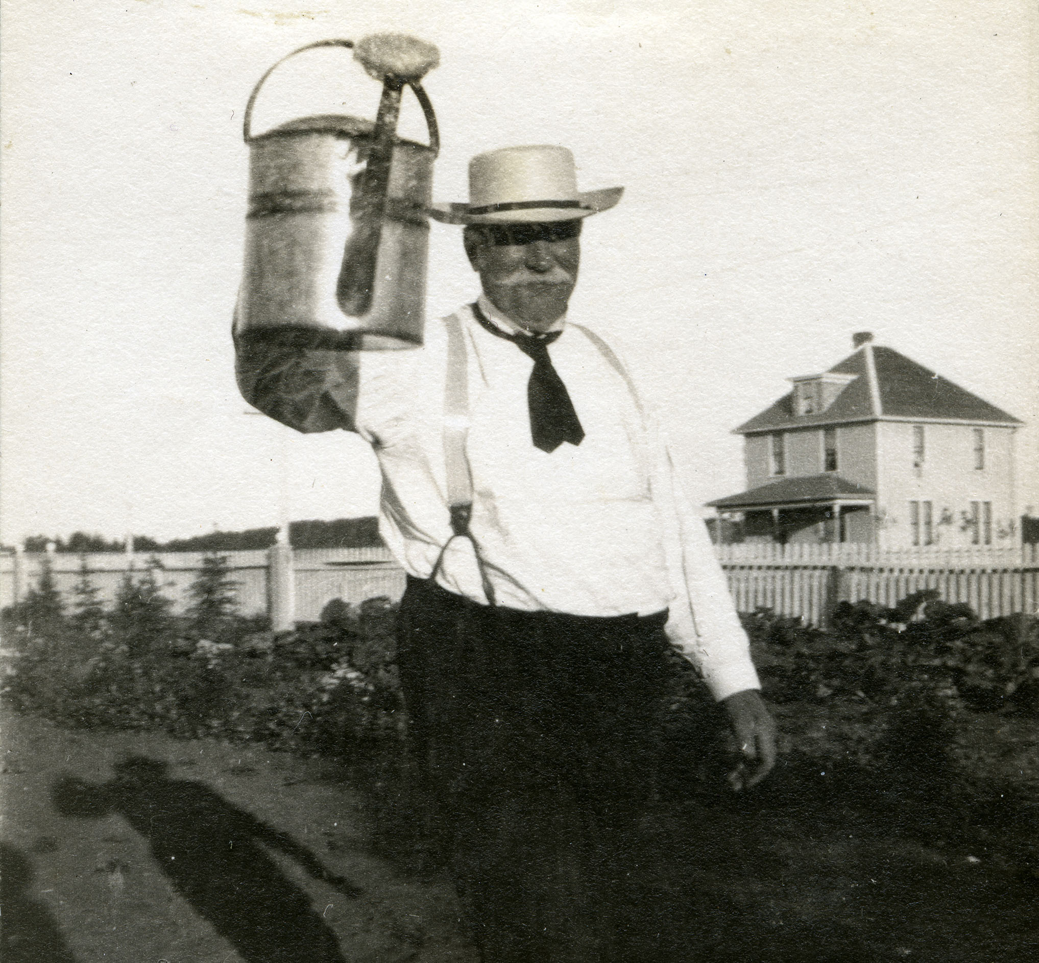 Leonard Gaetz with watering can