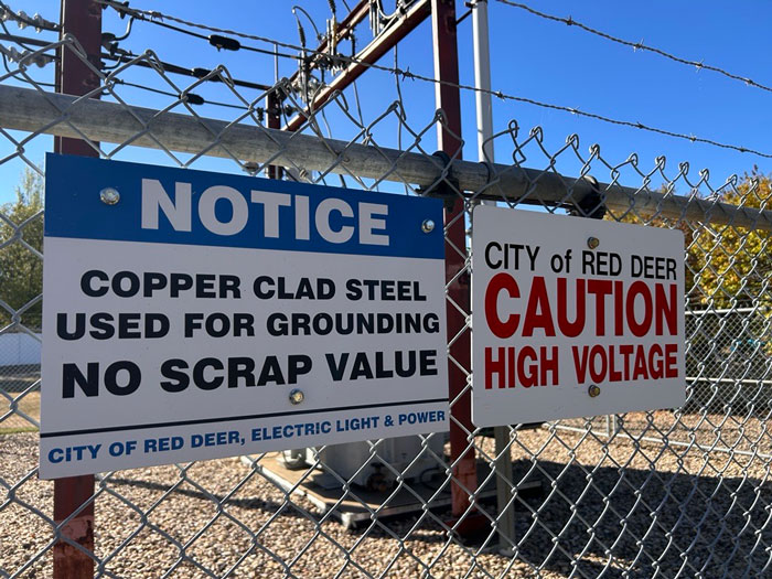 Photo of a sign regarding copper wire