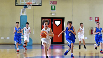 Youth playing basketball