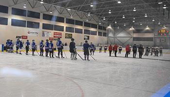 Collicutt Arena with hockey players